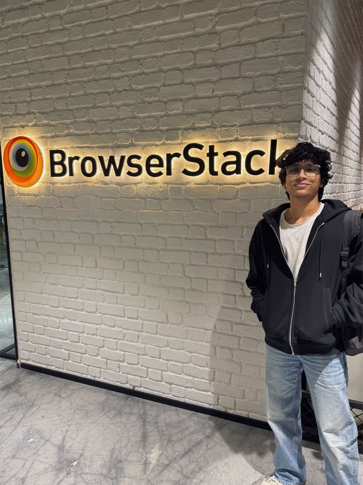 Next to the BrowserStack sign